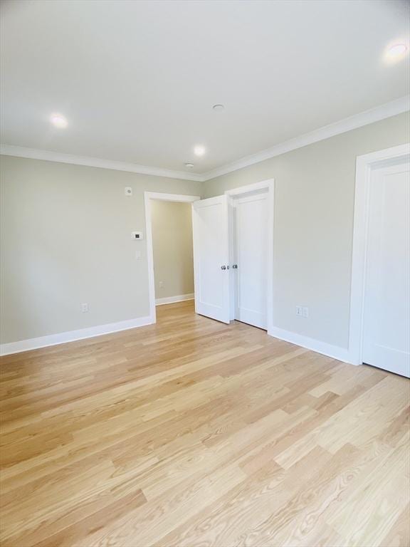 15 Yuill Cir Unit 3, Boston, MA 02136 - spare room featuring light wood-style flooring, baseboards, ornamental molding, and recessed lighting