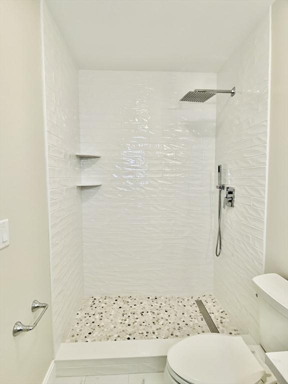 15 Yuill Cir Unit 3, Boston, MA 02136 - full bath featuring toilet and tiled shower