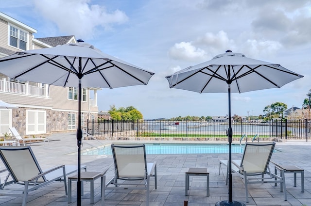 view of pool with a patio