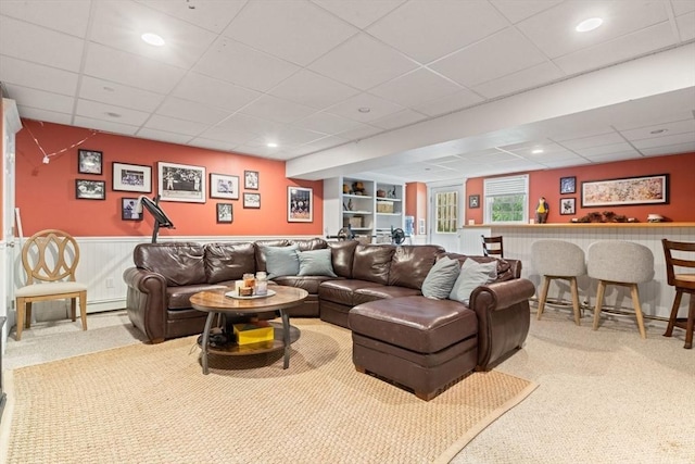 14 Cushman Lndg, Plympton, MA 02367 - carpeted living room featuring a paneled ceiling and a wainscoted wall