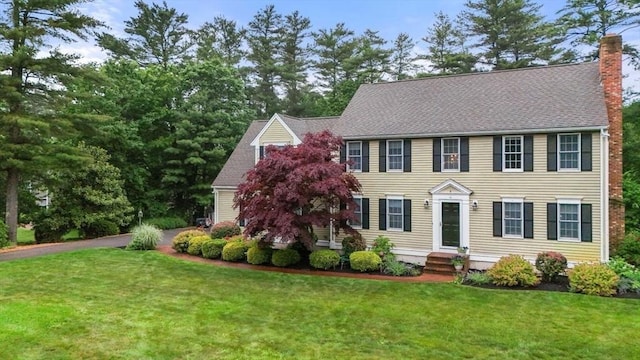14 Cushman Lndg, Plympton, MA 02367 - colonial inspired home with a chimney, a front lawn, entry steps, and a shingled roof