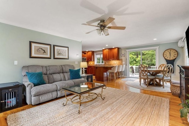 14 Cushman Lndg, Plympton, MA 02367 - living area with crown molding, ceiling fan, light wood finished floors, and recessed lighting