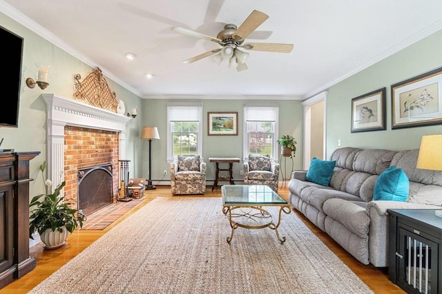 14 Cushman Lndg, Plympton, MA 02367 - living area with wood finished floors, a ceiling fan, ornamental molding, a brick fireplace, and a baseboard heating unit