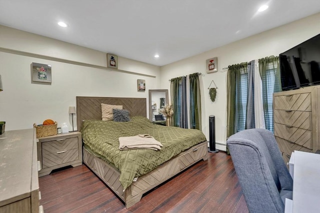 bedroom with dark wood-type flooring, recessed lighting, and baseboard heating