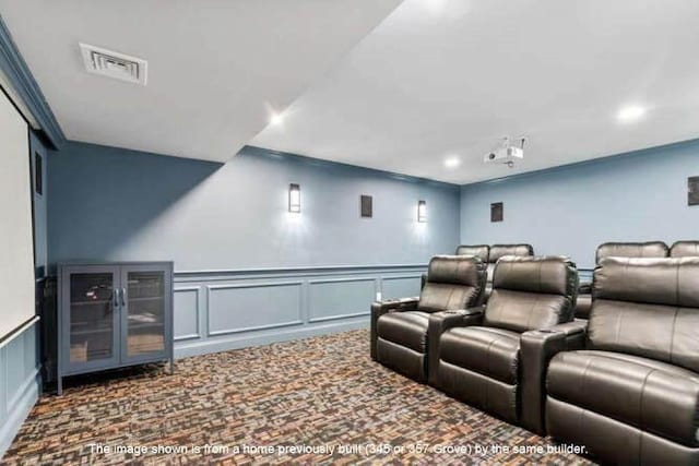 363 Grove St, Reading, MA 01867 - cinema featuring a decorative wall, wainscoting, and recessed lighting