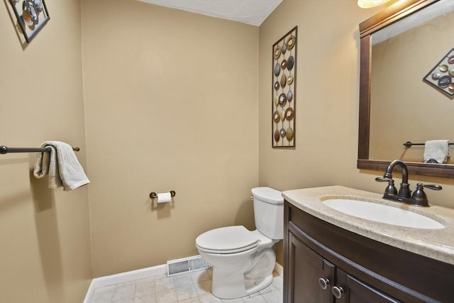 125 Chapin Rd Unit 3F, Hudson, MA 01749 - bathroom with toilet, vanity, and baseboards