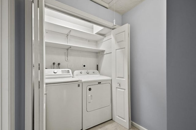 125 Chapin Rd Unit 3F, Hudson, MA 01749 - laundry area with attic access, washer and clothes dryer, and baseboards