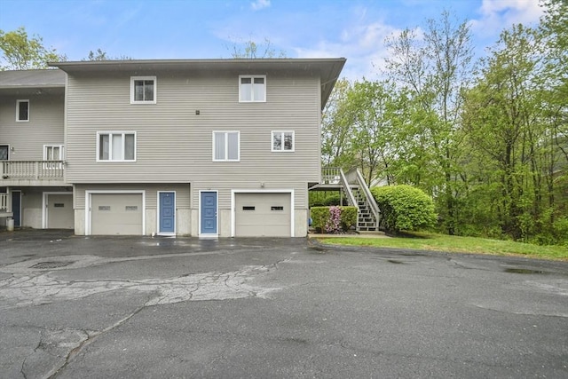 125 Chapin Rd Unit 3F, Hudson, MA 01749 - back of house with stairway, driveway, and a garage