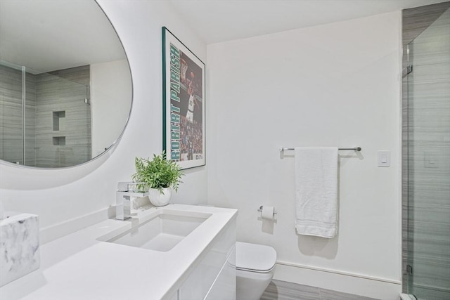 26 Salisbury Rd Unit 26, Newton, MA 02458 - bathroom with vanity, toilet, a shower stall, and baseboards