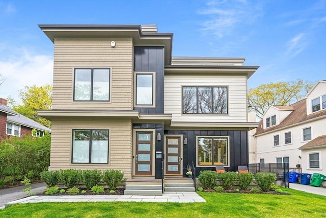 26 Salisbury Rd Unit 26, Newton, MA 02458 - contemporary home featuring board and batten siding and a front yard