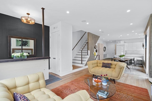 26 Salisbury Rd Unit 26, Newton, MA 02458 - living area with stairs, light wood finished floors, recessed lighting, and baseboards