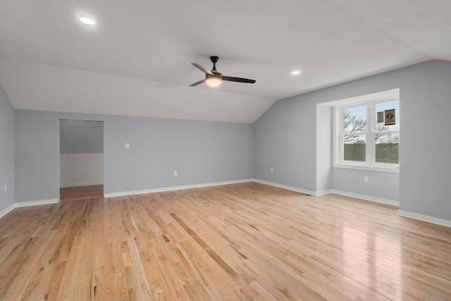 bonus room featuring ceiling fan, light hardwood / wood-style flooring, and vaulted ceiling