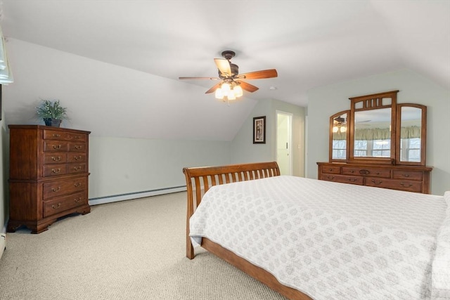 carpeted bedroom with vaulted ceiling, baseboard heating, and ceiling fan