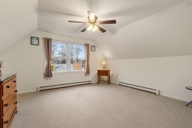 additional living space with lofted ceiling, baseboard heating, and light carpet