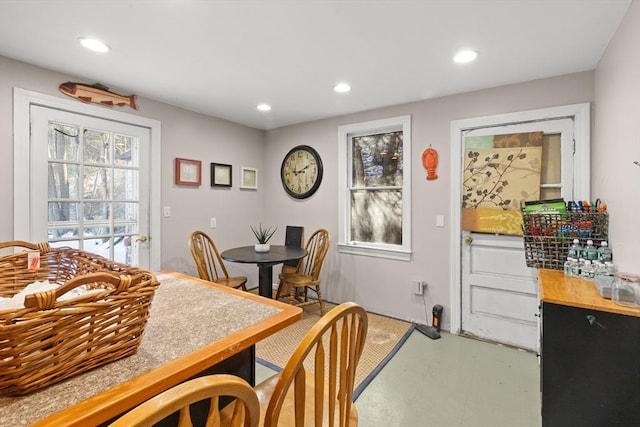 dining room featuring recessed lighting