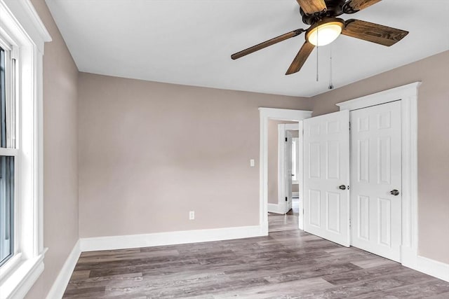 26 Olivine St, Chicopee, MA 01013 - unfurnished bedroom with wood finished floors and a ceiling fan