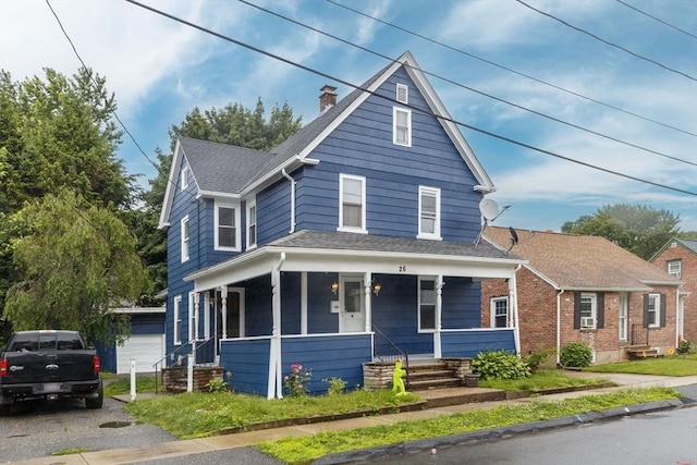 26 Olivine St, Chicopee, MA 01013 - traditional style home with an outbuilding, a porch, a chimney, and roof with shingles