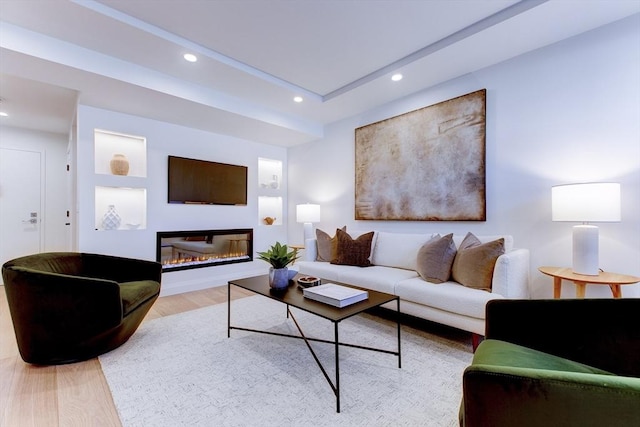 living room with light hardwood / wood-style flooring