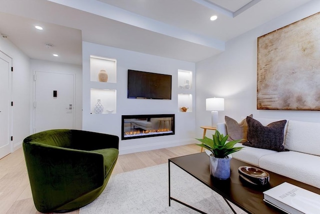 living room with light hardwood / wood-style flooring