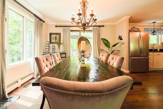 597 Fisher Rd, Dartmouth, MA 02747 - dining area with a chandelier, healthy amount of natural light, dark wood-style floors, baseboard heating, and ornamental molding