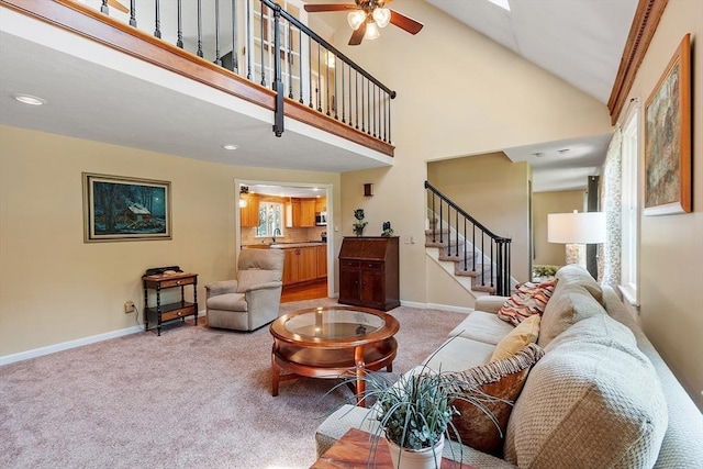 3 Sycamore Dr, Rutland, MA 01543 - carpeted living room with stairway, ceiling fan, a high ceiling, and recessed lighting