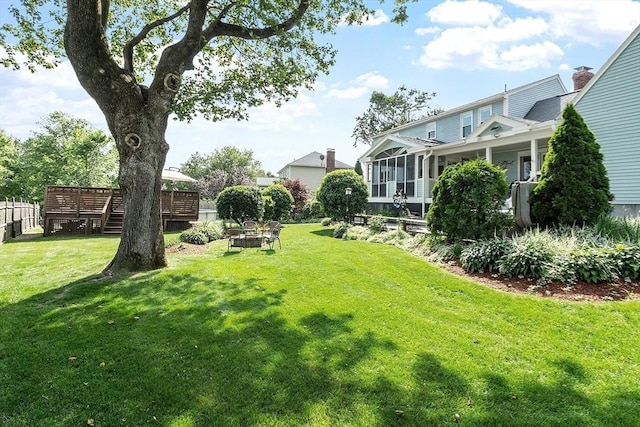 3 Sycamore Dr, Rutland, MA 01543 - view of yard featuring a sunroom and a deck