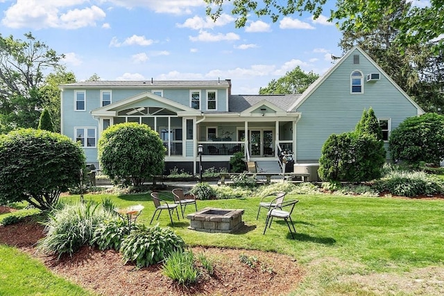 3 Sycamore Dr, Rutland, MA 01543 - rear view of property with a fire pit and a lawn