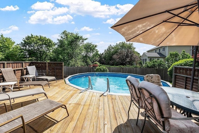 3 Sycamore Dr, Rutland, MA 01543 - view of swimming pool featuring a deck and a fenced backyard