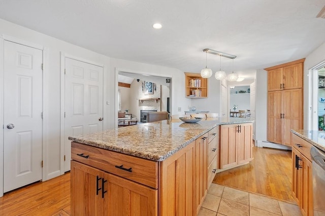 3 Sycamore Dr, Rutland, MA 01543 - kitchen with a kitchen island, light stone countertops, stainless steel dishwasher, light wood-style floors, and recessed lighting