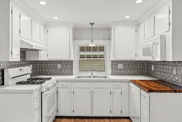 5 London Rd, Salem, NH 03079 - kitchen with white appliances, a sink, under cabinet range hood, white cabinets, and tasteful backsplash