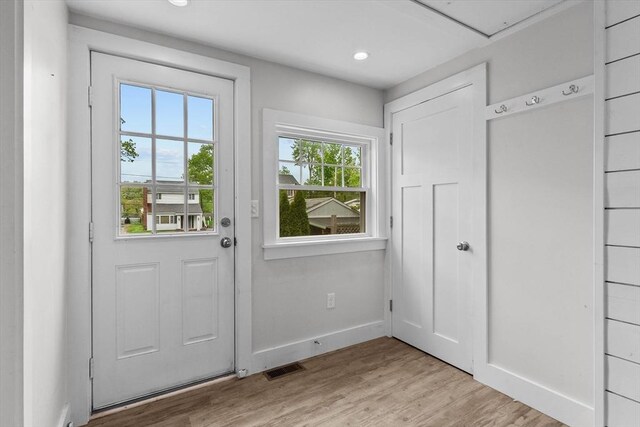 5 London Rd, Salem, NH 03079 - doorway featuring light wood-type flooring, baseboards, and recessed lighting