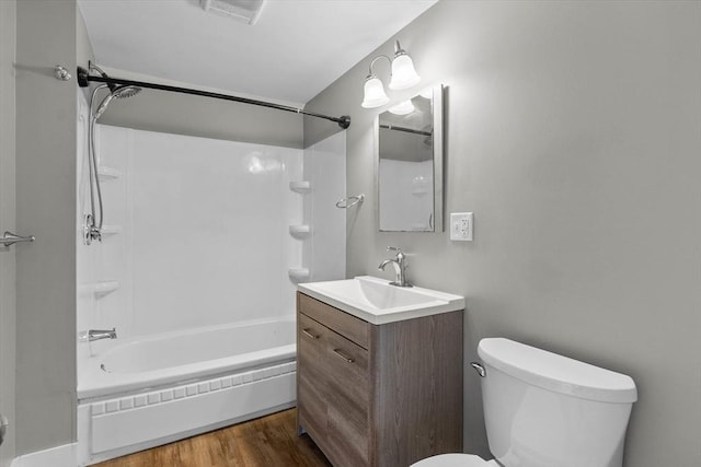 5 London Rd, Salem, NH 03079 - bathroom with toilet, shower / tub combination, wood finished floors, and vanity