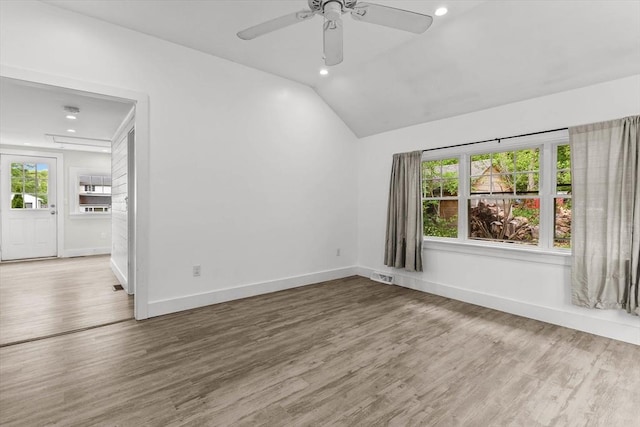 5 London Rd, Salem, NH 03079 - unfurnished room featuring baseboards, wood finished floors, recessed lighting, lofted ceiling, and a ceiling fan