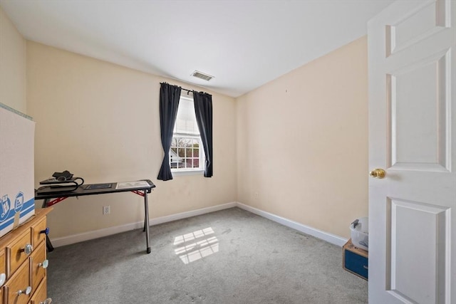 interior space with visible vents, carpet flooring, and baseboards