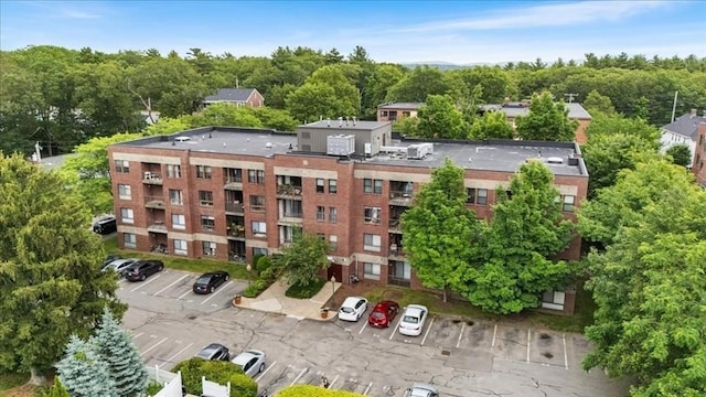 14 Heron St Unit 209, Boston, MA 02132 - view of building exterior with uncovered parking