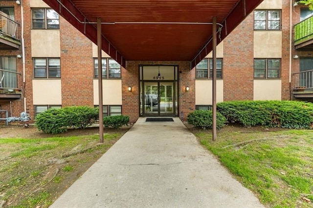 14 Heron St Unit 209, Boston, MA 02132 - entrance to property featuring stucco siding and brick siding