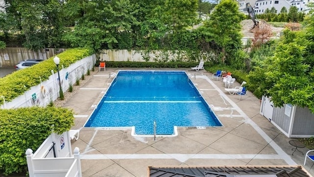 14 Heron St Unit 209, Boston, MA 02132 - community pool featuring a patio and a fenced backyard