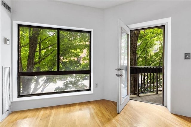 14 Heron St Unit 209, Boston, MA 02132 - entryway featuring healthy amount of natural light and wood finished floors