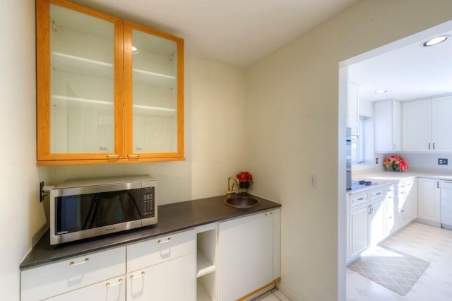 kitchen with sink and white cabinets