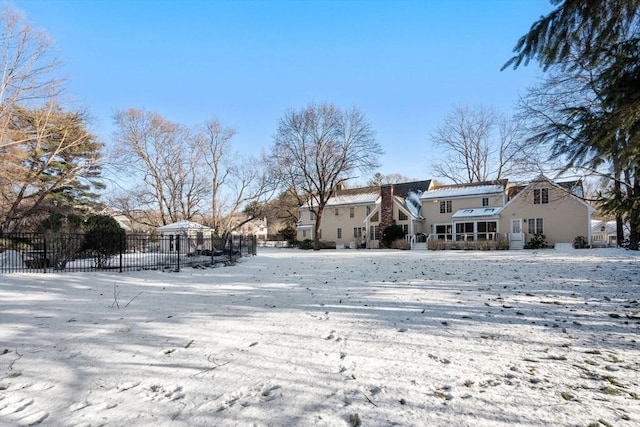 view of snow covered property