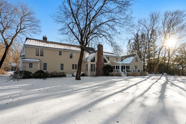 view of snow covered property