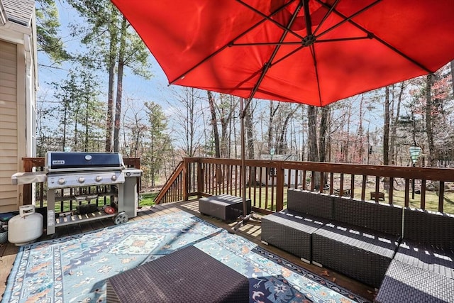 wooden deck with an outdoor living space