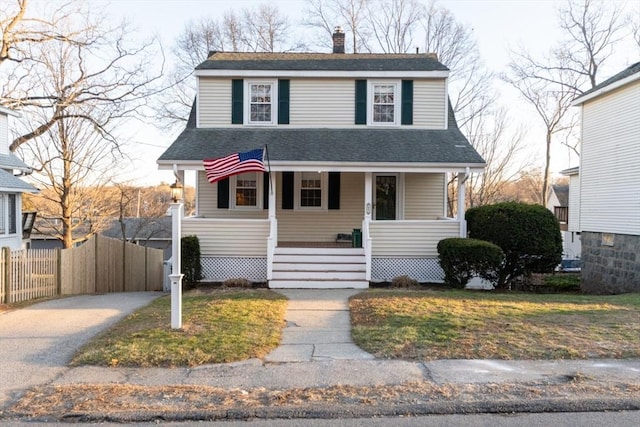 front of property featuring covered porch