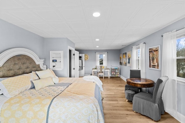 bedroom featuring light wood-type flooring