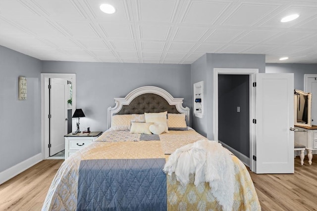 bedroom featuring light hardwood / wood-style flooring