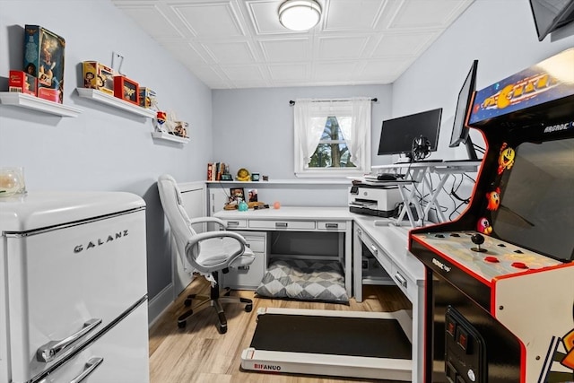 home office featuring light hardwood / wood-style flooring