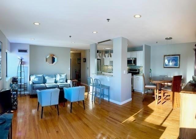 living room featuring light hardwood / wood-style floors