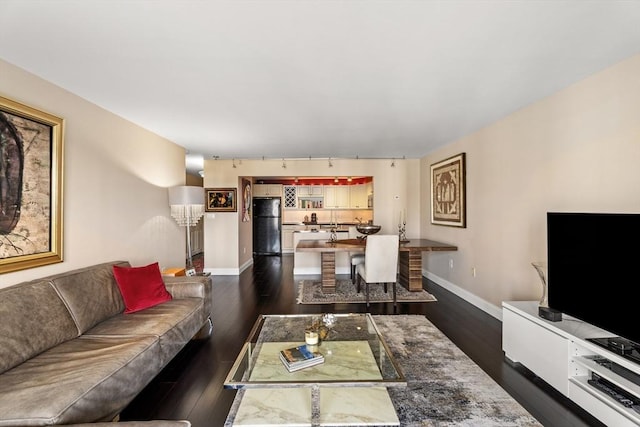 131 Coolidge Ave Unit 621, Watertown, MA 02472 - living area featuring dark wood-style floors and rail lighting