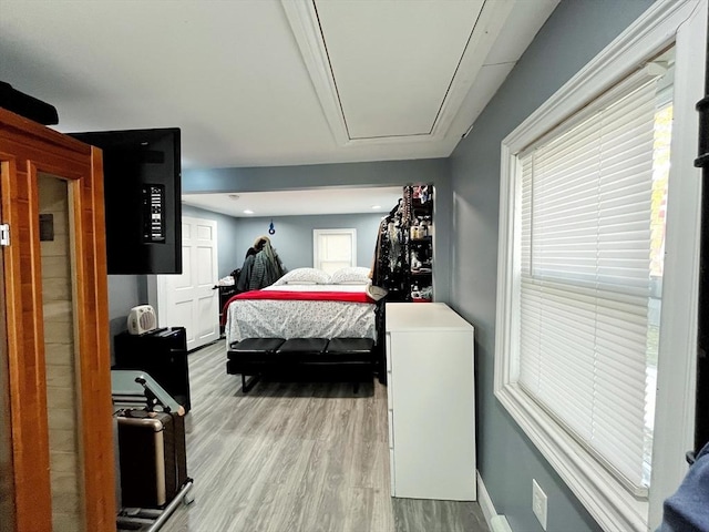 27 Overlook Rd, Holbrook, MA 02343 - bedroom with wood finished floors, attic access, and baseboards
