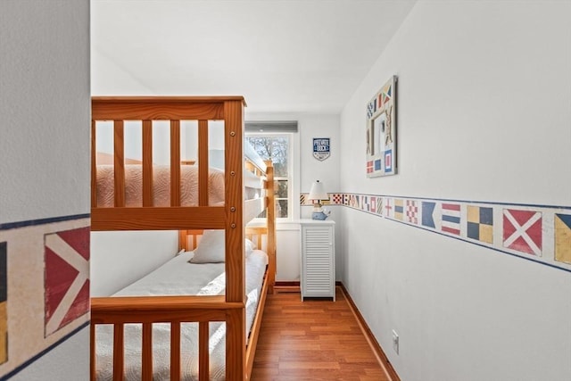 bedroom with light hardwood / wood-style floors